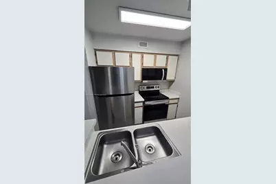 2881 N Oakland Forest Dr #103, Oakland Park, FL 33309 - Photo 3