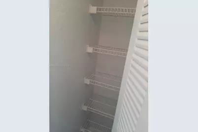 2881 N Oakland Forest Dr #103, Oakland Park, FL 33309 - Photo 15