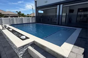 910 NW 38th Ave, Cape Coral, FL 33993 - Photo 7