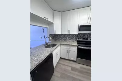 10049 Winding Lake Rd #103, Sunrise, FL 33351 - Photo 3