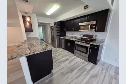 701 Three Islands Blvd #110, Hallandale Beach, FL 33009 - Photo 1