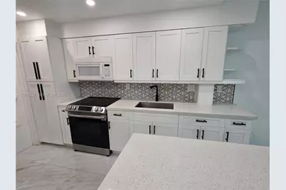 1550 NE 191st St #105-B, Miami, FL 33179 - Photo 1