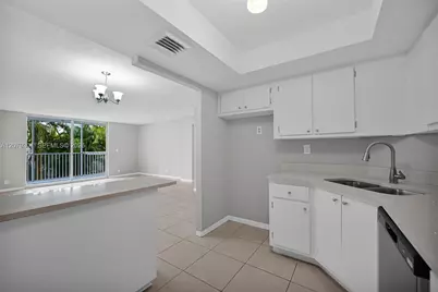 100 Golden Isles Dr #109, Hallandale Beach, FL 33009 - Photo 13