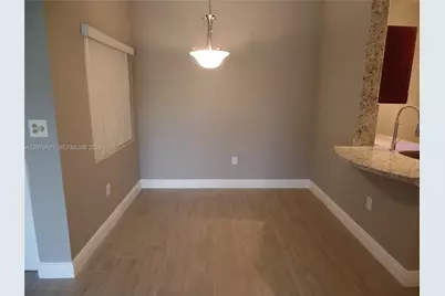 2881 N Oakland Forest Dr #311, Oakland Park, FL 33309 - Photo 9