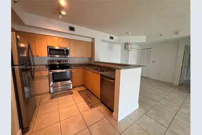 7920 N Nob Hill Rd #103, Tamarac, FL 33321 - Photo 3