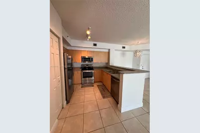 7920 N Nob Hill Rd #103, Tamarac, FL 33321 - Photo 7