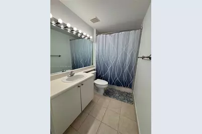 7920 N Nob Hill Rd #103, Tamarac, FL 33321 - Photo 13