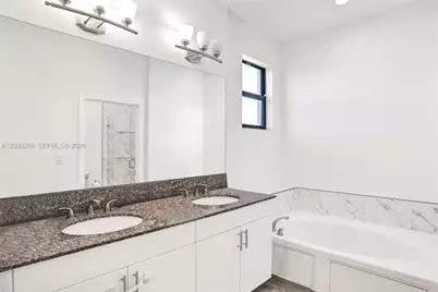 606 NE 191st Ter, Miami, FL 33179 - Photo 17