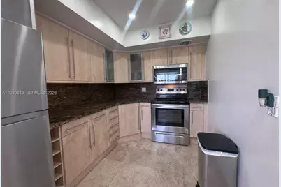 455 Golden Isles Dr #310, Hallandale Beach, FL 33009 - Photo 3