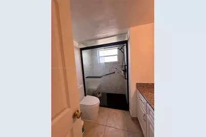1670 NE 191st St #100-3, Miami, FL 33179 - Photo 7