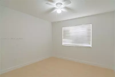 7920 N Nob Hill Rd #305, Tamarac, FL 33321 - Photo 11