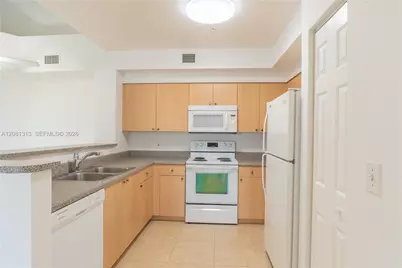 7920 N Nob Hill Rd #305, Tamarac, FL 33321 - Photo 1