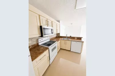 10131 W Sunrise Blvd #204, Plantation, FL 33322 - Photo 1