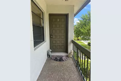 9205 Pecky Cypress Ln #8F, Boca Raton, FL 33428 - Photo 1