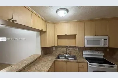 6070 W 18th Ave #306, Hialeah, FL 33012 - Photo 3