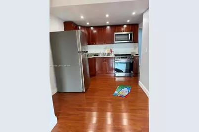 4301 NW South Tamiami Canal Dr #3-302, Miami, FL 33126 - Photo 1