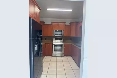 8380 NW 103rd St #105G, Hialeah Gardens, FL 33016 - Photo 3