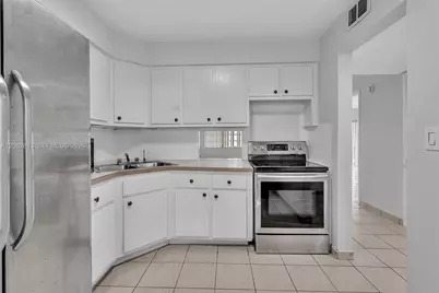 1540 NE 191st St #320, Miami, FL 33179 - Photo 7