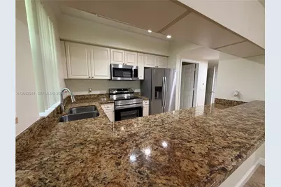 6956 W Sample Rd #6956, Coral Springs, FL 33067 - Photo 5