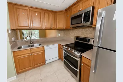 3410 Foxcroft Rd #314, Miramar, FL 33025 - Photo 11