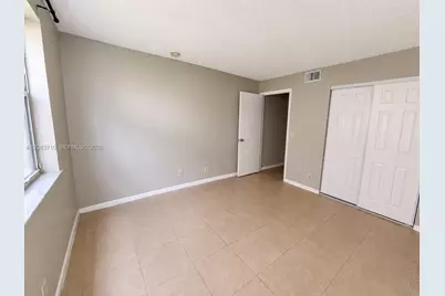8821 Wiles Rd #102, Coral Springs, FL 33067 - Photo 9