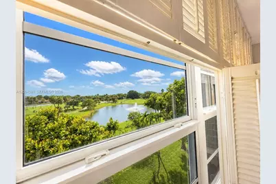 3980 Oaks Clubhouse Dr #409, Pompano Beach, FL 33069 - Photo 17