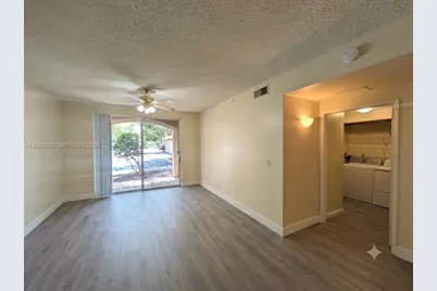 8060 N Nob Hill Rd #101, Tamarac, FL 33321 - Photo 1