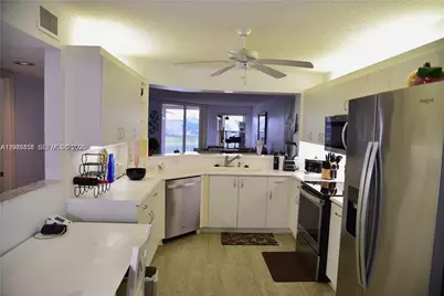 7730 Granville Dr #202, Tamarac, FL 33321 - Photo 3