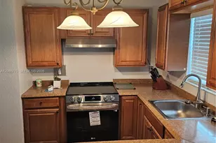 110 NW 9th Ave, South Bay, FL 33493 - Photo 7