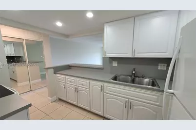 1800 Sans Souci Blvd #428, North Miami, FL 33181 - Photo 11