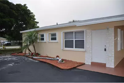 571 NE 61st St, Oakland Park, FL 33334 - Photo 1