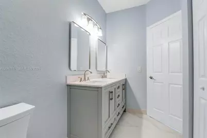 8870 N Isles Cir, Tamarac, FL 33321 - Photo 17