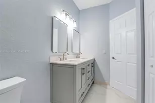 8870 N Isles Cir, Tamarac, FL 33321 - Photo 17