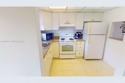 2761 N Pine Island Rd #310, Sunrise, FL 33322 - Photo 13