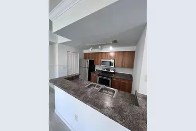5980 W Sample Rd #301, Coral Springs, FL 33067 - Photo 5