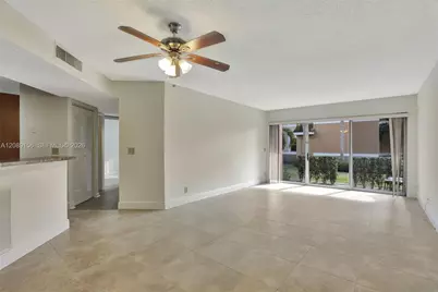 8891 Wiles Rd #102, Coral Springs, FL 33067 - Photo 5