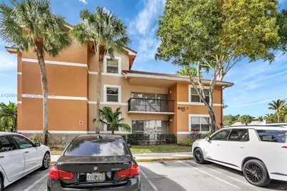 8891 Wiles Rd #102, Coral Springs, FL 33067 - Photo 1