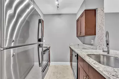 2811 N Oakland Forest Dr #205, Oakland Park, FL 33309 - Photo 11