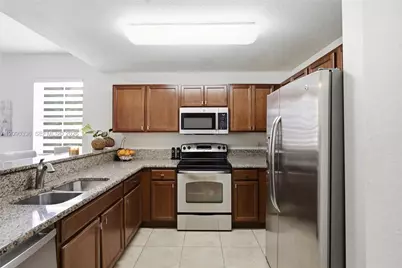 11605 NW 89th St #228, Doral, FL 33178 - Photo 7