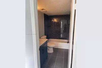 4015 W McNab Rd #D305, Pompano Beach, FL 33069 - Photo 13