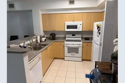 8020 N Nob Hill Rd #204, Tamarac, FL 33321 - Photo 5