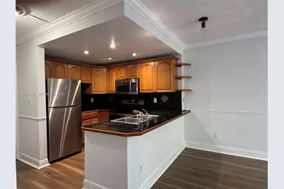 680 Miller Dr #W301, Miami Springs, FL 33166 - Photo 3