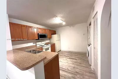 10161 W Sunrise Blvd #203, Plantation, FL 33322 - Photo 1