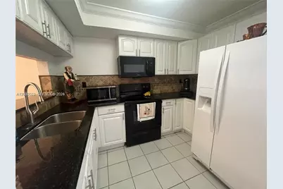 961 W 37th Ter #30, Hialeah, FL 33012 - Photo 3