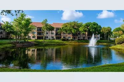 8741 Wiles Rd #204, Coral Springs, FL 33067 - Photo 11