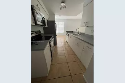 5840 W Sample Rd #105, Coral Springs, FL 33067 - Photo 1