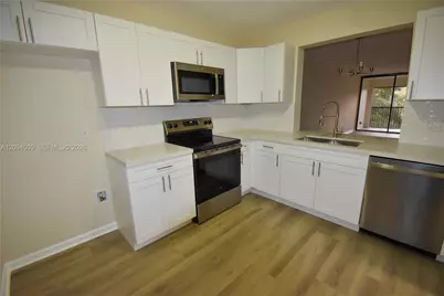 8592 W Sunrise Blvd #303, Plantation, FL 33322 - Photo 1