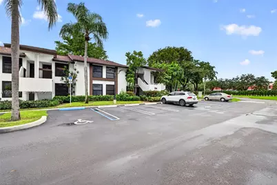 204 Lake Pointe Dr #107, Oakland Park, FL 33309 - Photo 1