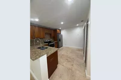 10125 W Sunrise Blvd #303, Plantation, FL 33322 - Photo 9