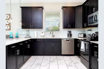 1568 Maidstone Ct, Champions Gate, FL 33896 - Photo 21